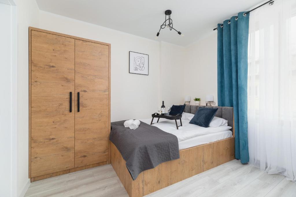 Posteľ alebo postele v izbe v ubytovaní Modern Studio Cracow Rakowicka 14 by Noclegi Renters