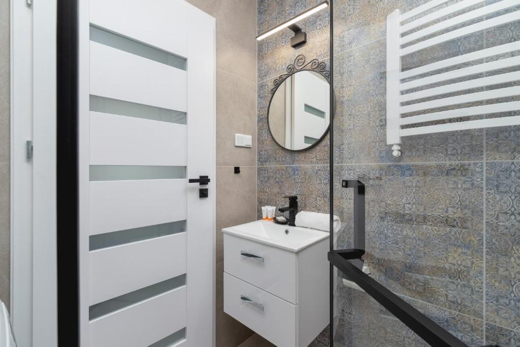 Kúpeľňa v ubytovaní Modern Studio Cracow Rakowicka 14 by Noclegi Renters