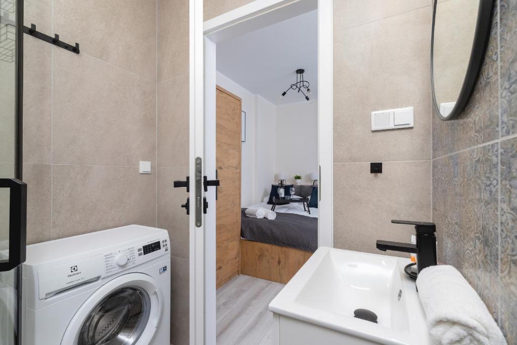 Kúpeľňa v ubytovaní Modern Studio Cracow Rakowicka 14 by Noclegi Renters