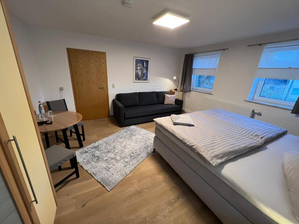 Postel nebo postele na pokoji v ubytování Gästezimmer Kirchdorf