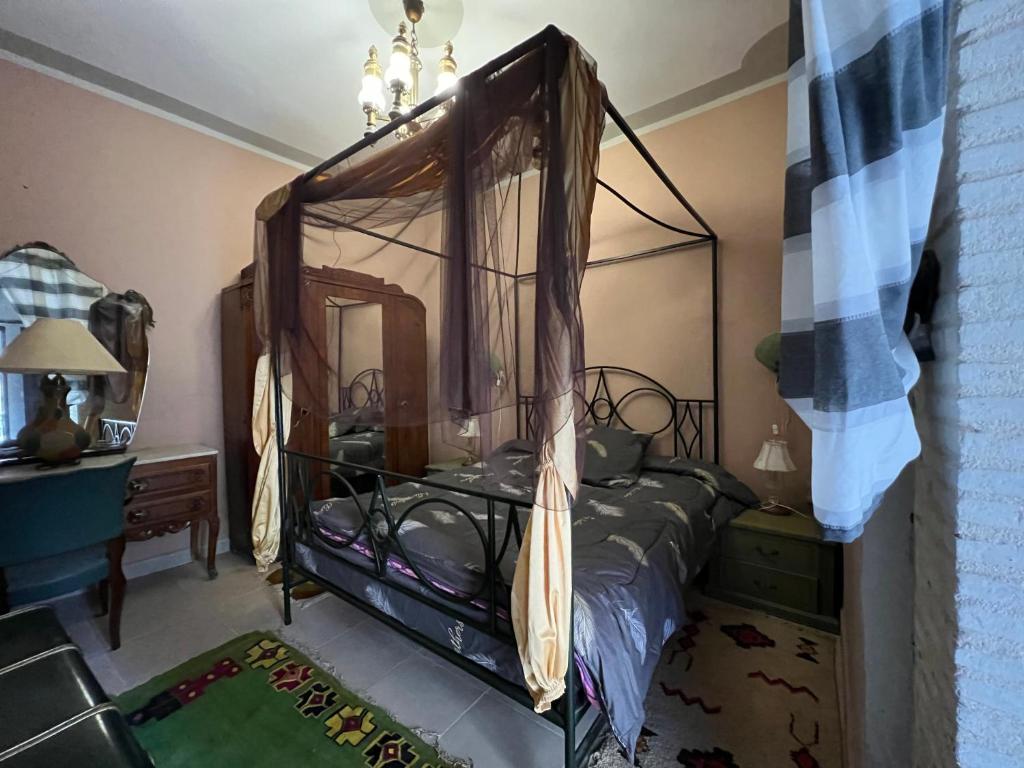 Postel nebo postele na pokoji v ubytování Dar El Sultan Tozeur
