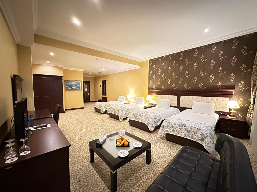 Postel nebo postele na pokoji v ubytování Modern Hotel