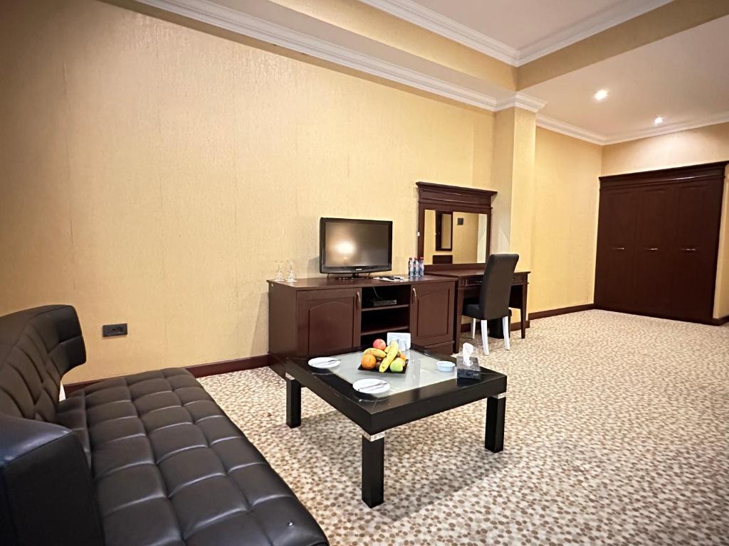 TV a/nebo společenská místnost v ubytování Modern Hotel