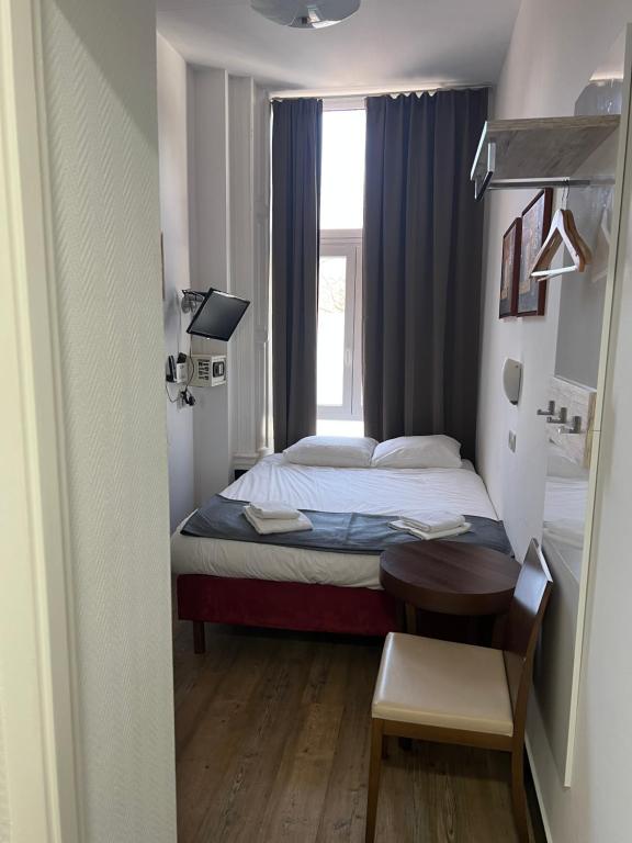Postel nebo postele na pokoji v ubytování MAX Hotel Amsterdam