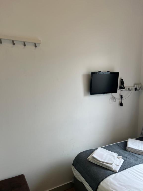 TV a/nebo společenská místnost v ubytování MAX Hotel Amsterdam
