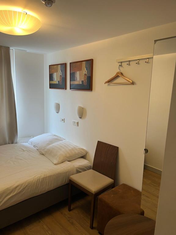 Postel nebo postele na pokoji v ubytování MAX Hotel Amsterdam