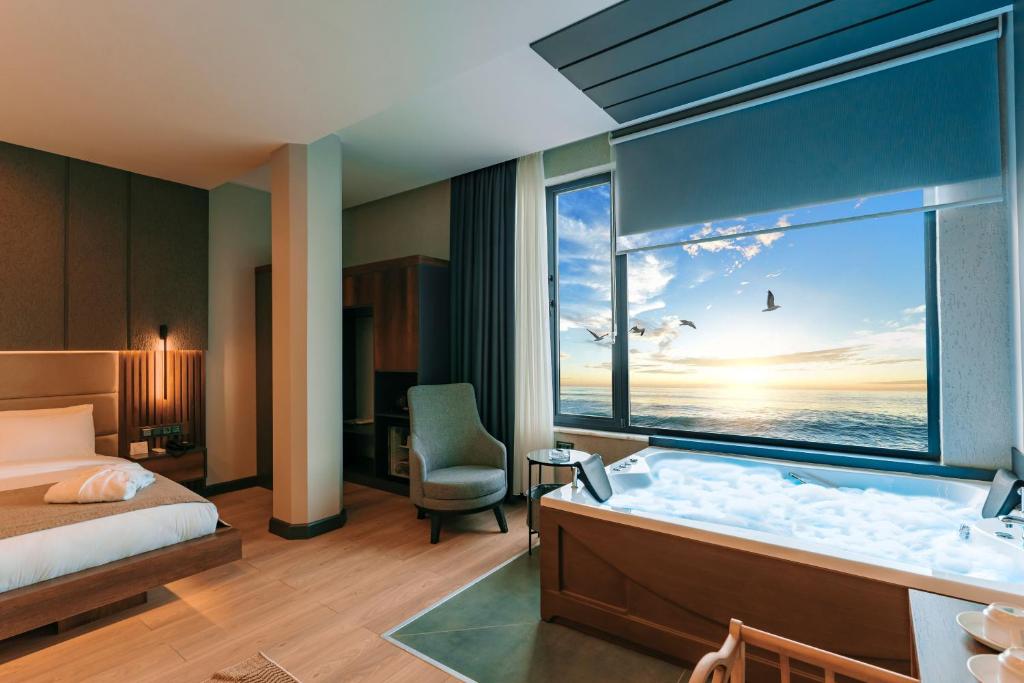 Кровать или кровати в номере Aksular Hotel