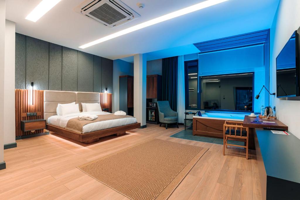 Кровать или кровати в номере Aksular Hotel