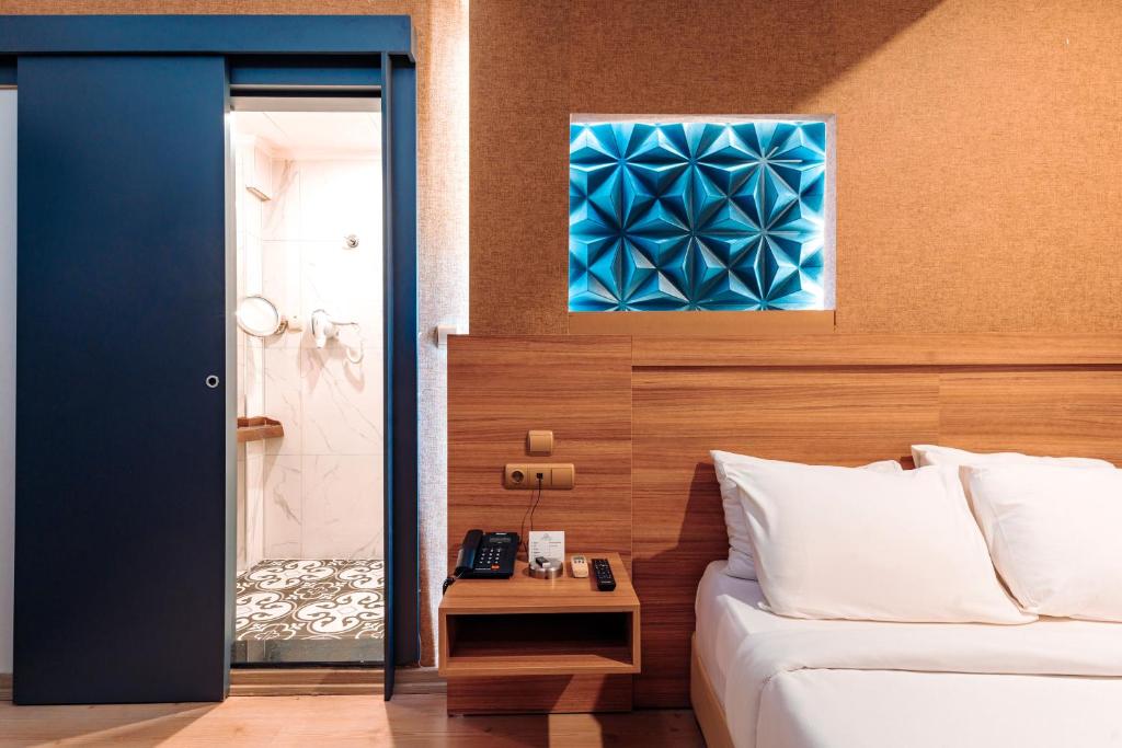 Кровать или кровати в номере Aksular Hotel