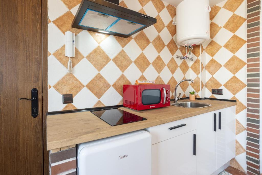 Kuchyň nebo kuchyňský kout v ubytování Urbe10 Pedregalejo Loft 3