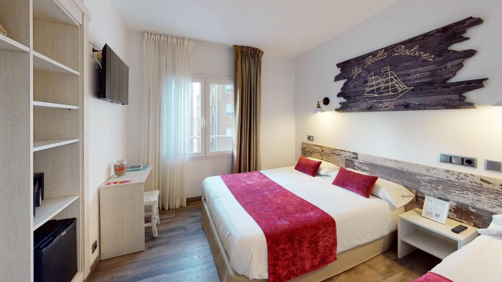 Posteľ alebo postele v izbe v ubytovaní Hotel Bella Dolores
