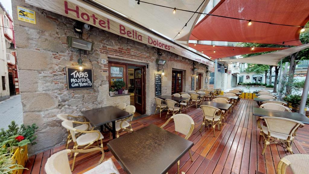Reštaurácia alebo iné gastronomické zariadenie v ubytovaní Hotel Bella Dolores