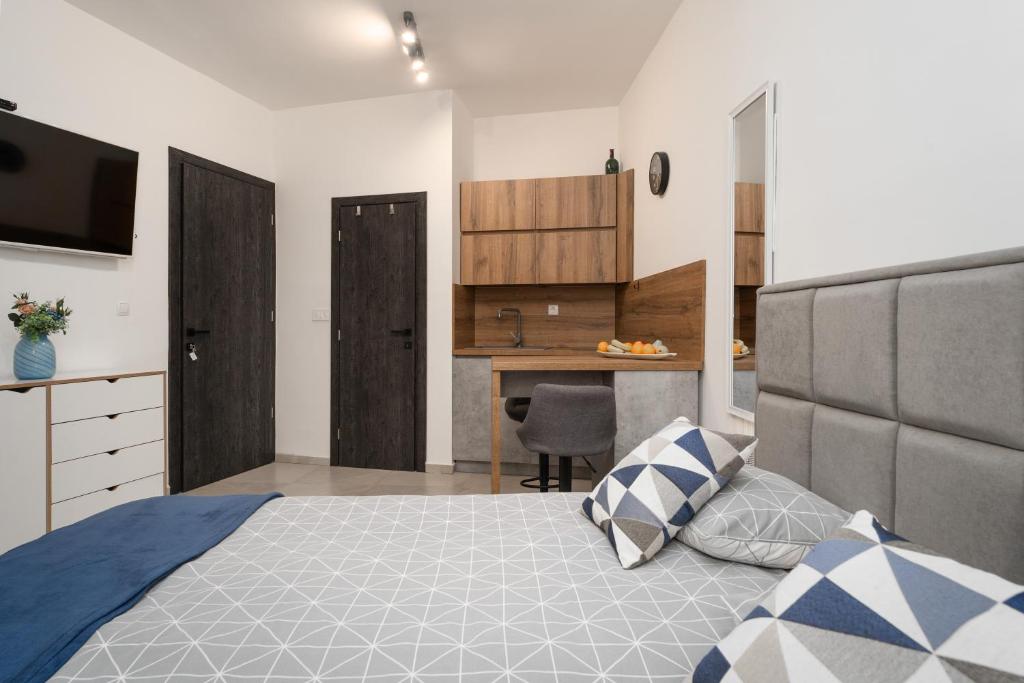 Kuchyň nebo kuchyňský kout v ubytování Apartments Casanova