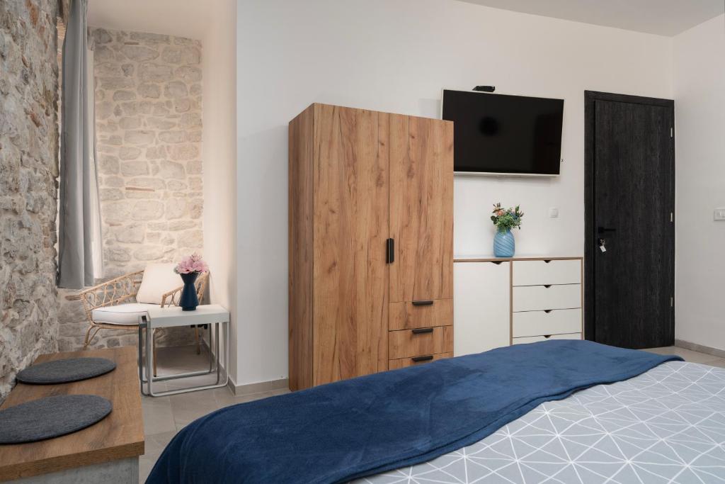 Postel nebo postele na pokoji v ubytování Apartments Casanova