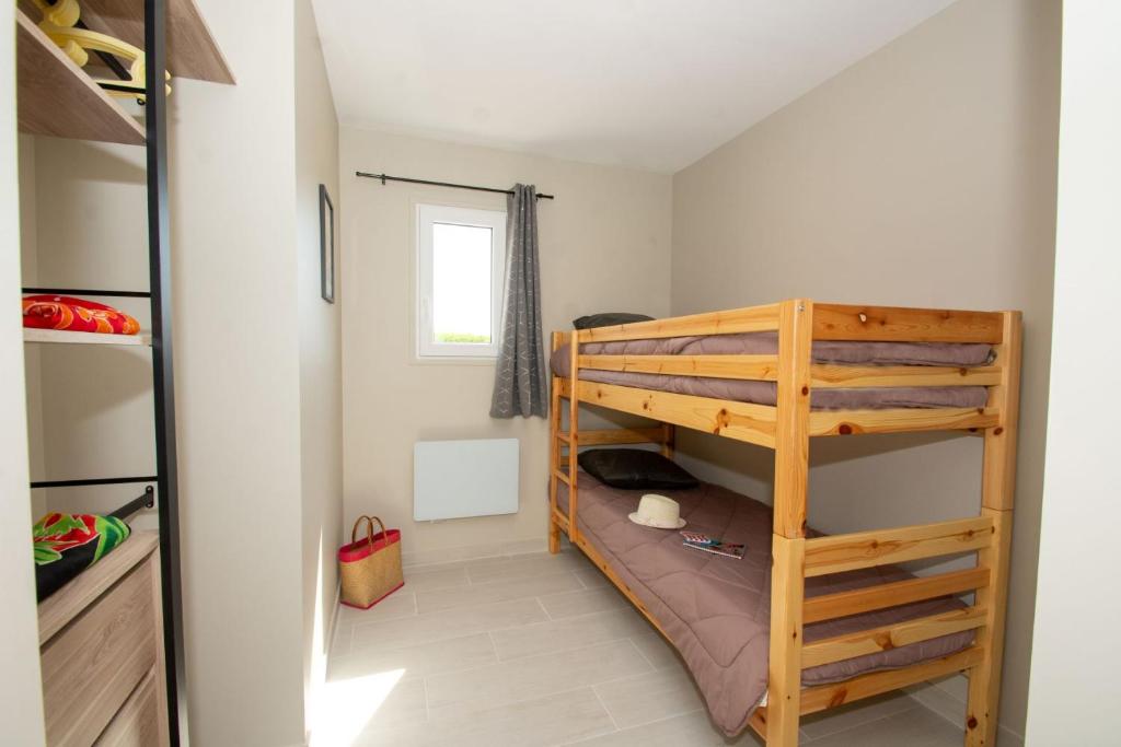 Postel nebo postele na pokoji v ubytování Parc Saint James Oasis Village