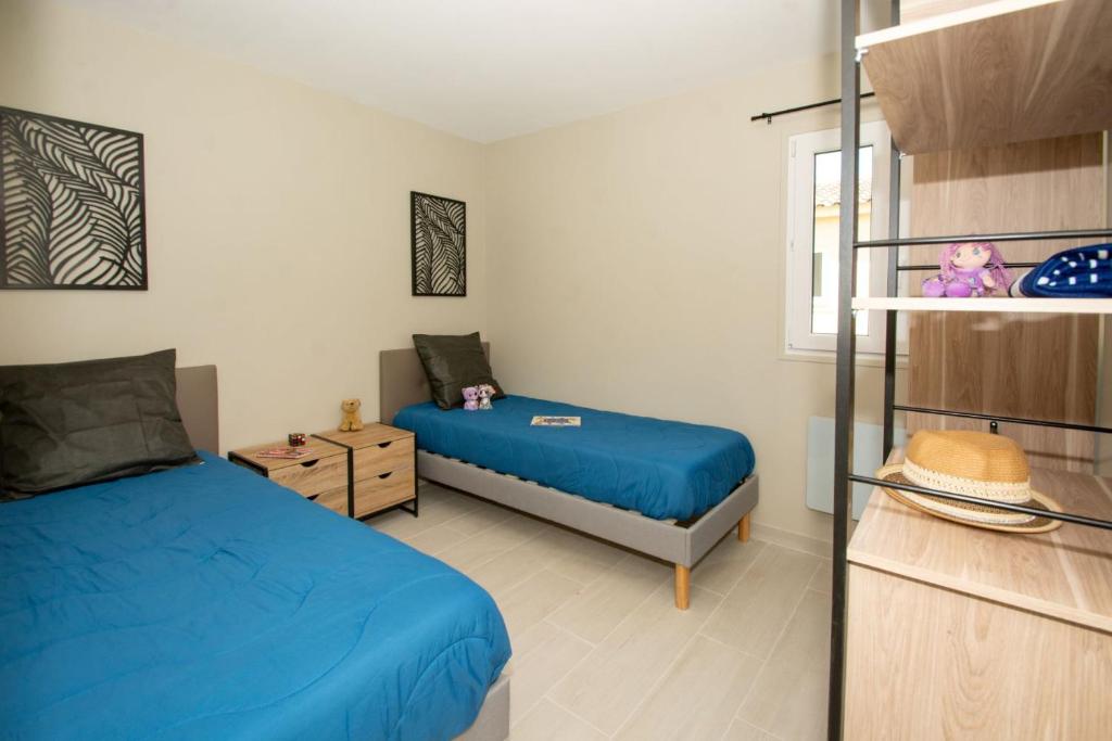 Postel nebo postele na pokoji v ubytování Parc Saint James Oasis Village