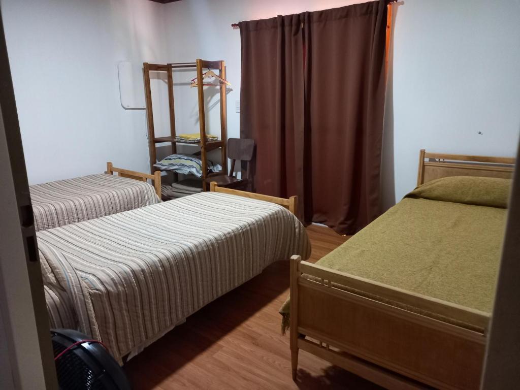 Katil atau katil-katil dalam bilik di Cabaña El Encuentro
