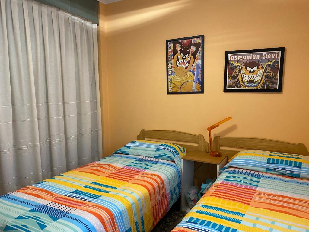 Posteľ alebo postele v izbe v ubytovaní VACACIONES VILLASANA