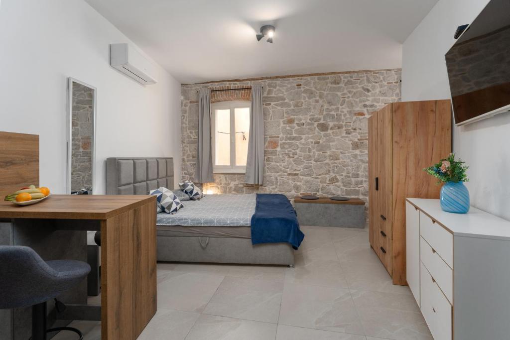 Kuchyň nebo kuchyňský kout v ubytování Apartments Casanova