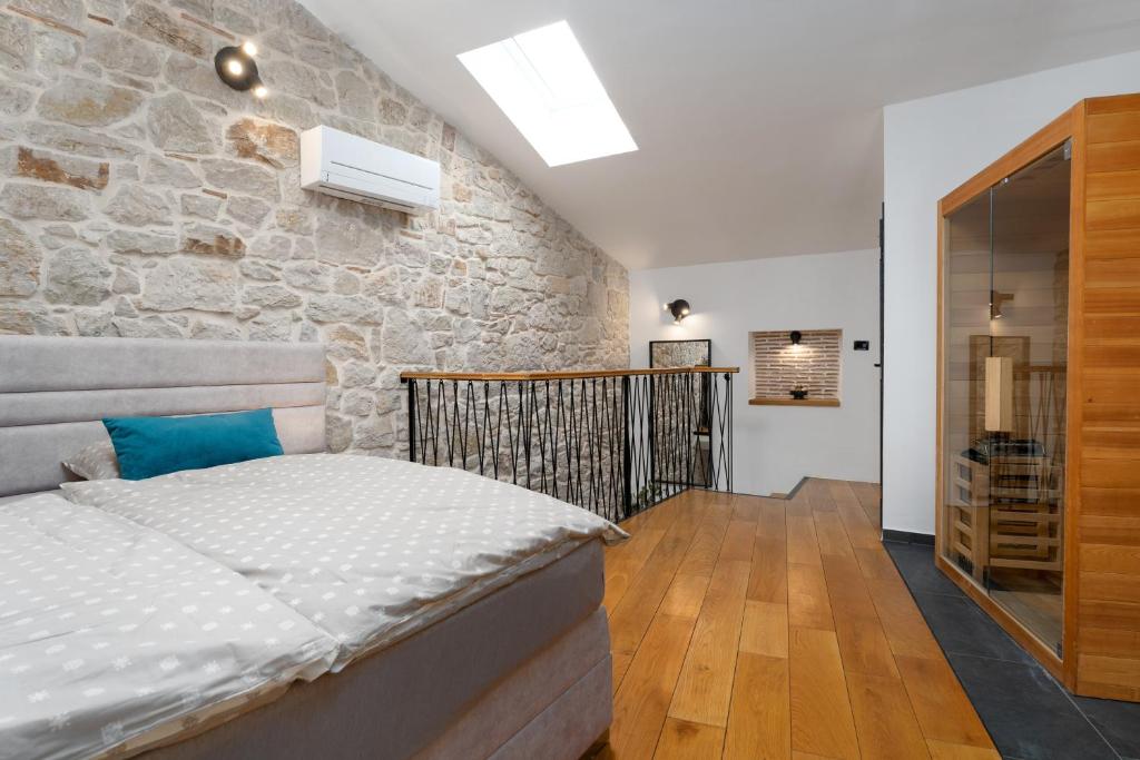 Postel nebo postele na pokoji v ubytování Apartments Casanova