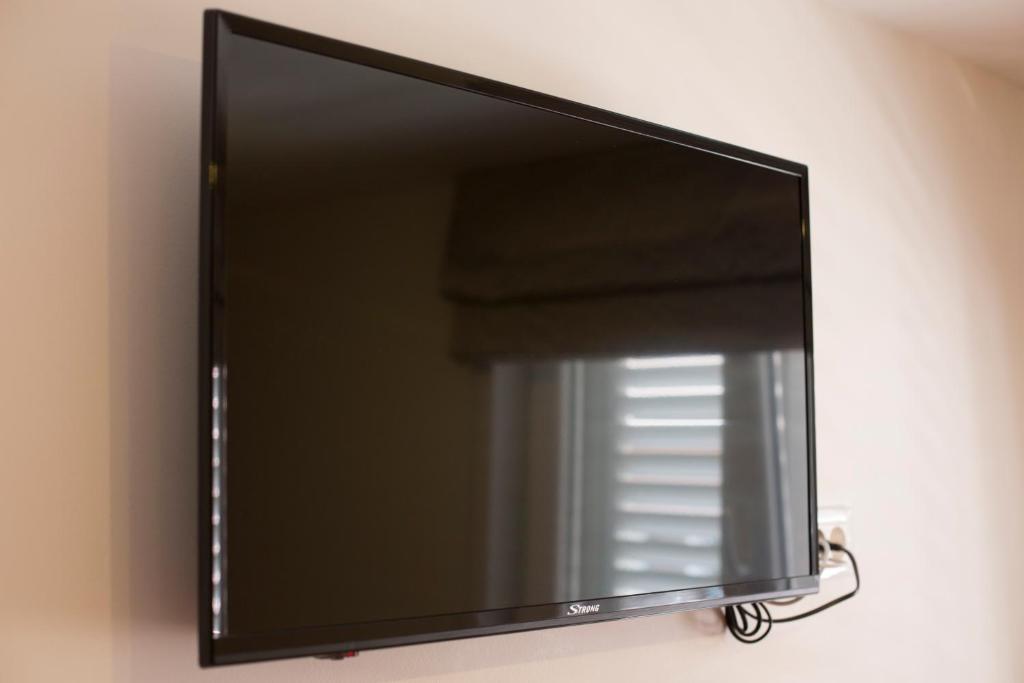 TV a/nebo společenská místnost v ubytování Villa Nena