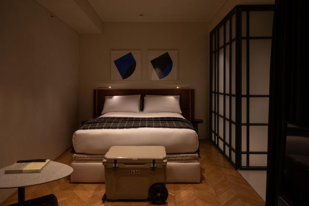 Postel nebo postele na pokoji v ubytování The Venice Venice Hotel