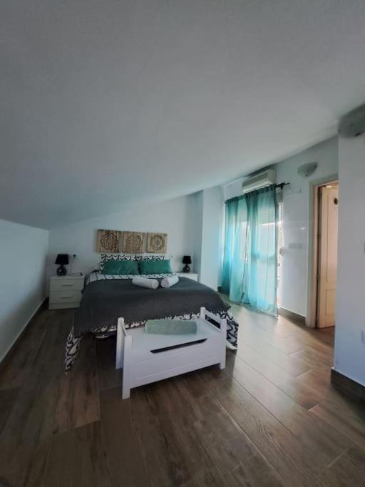 Postel nebo postele na pokoji v ubytování Vivienda Rural Sentirte 1 Centro de Aracena