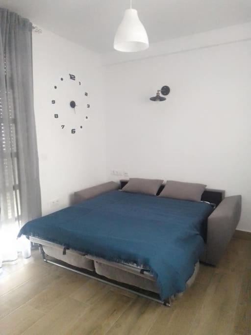 Postel nebo postele na pokoji v ubytování Vivienda Rural Sentirte 1 Centro de Aracena