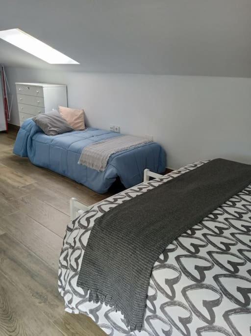 Postel nebo postele na pokoji v ubytování Vivienda Rural Sentirte 1 Centro de Aracena
