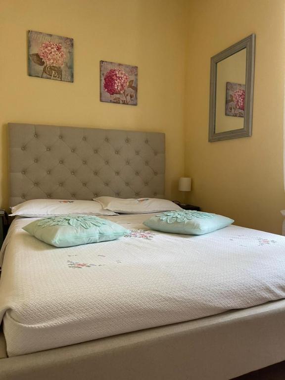 A bed or beds in a room at B&B La Bianchina