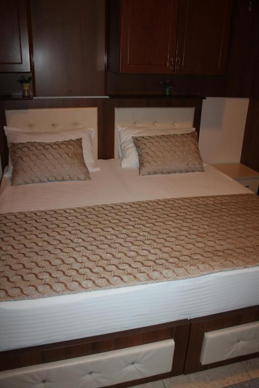 Postel nebo postele na pokoji v ubytování Hotel Hasmegaj