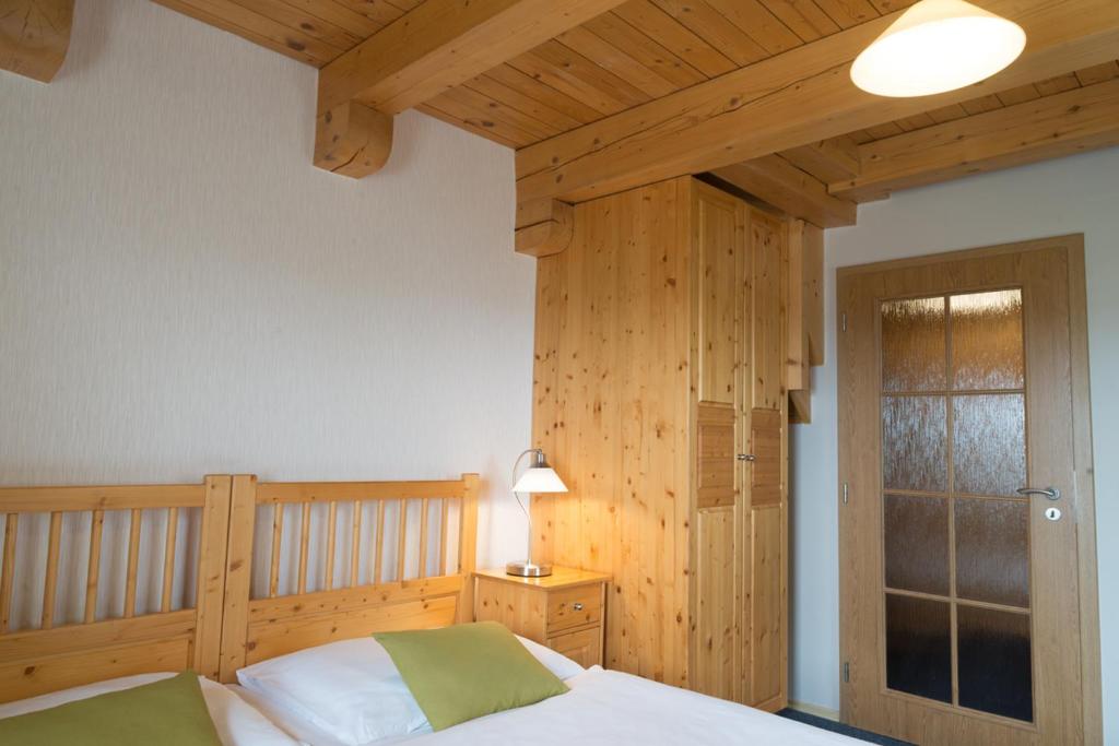 Postel nebo postele na pokoji v ubytování Hotel Pavlov