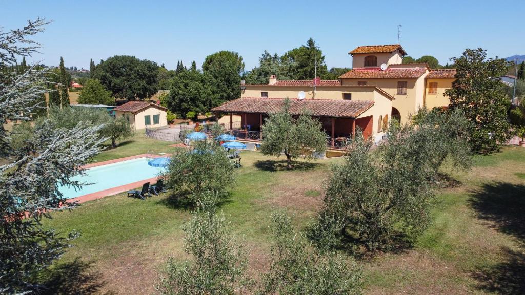 an aerial view of a house with a swimming pool at Agriturismo Michelangelo in Florence
