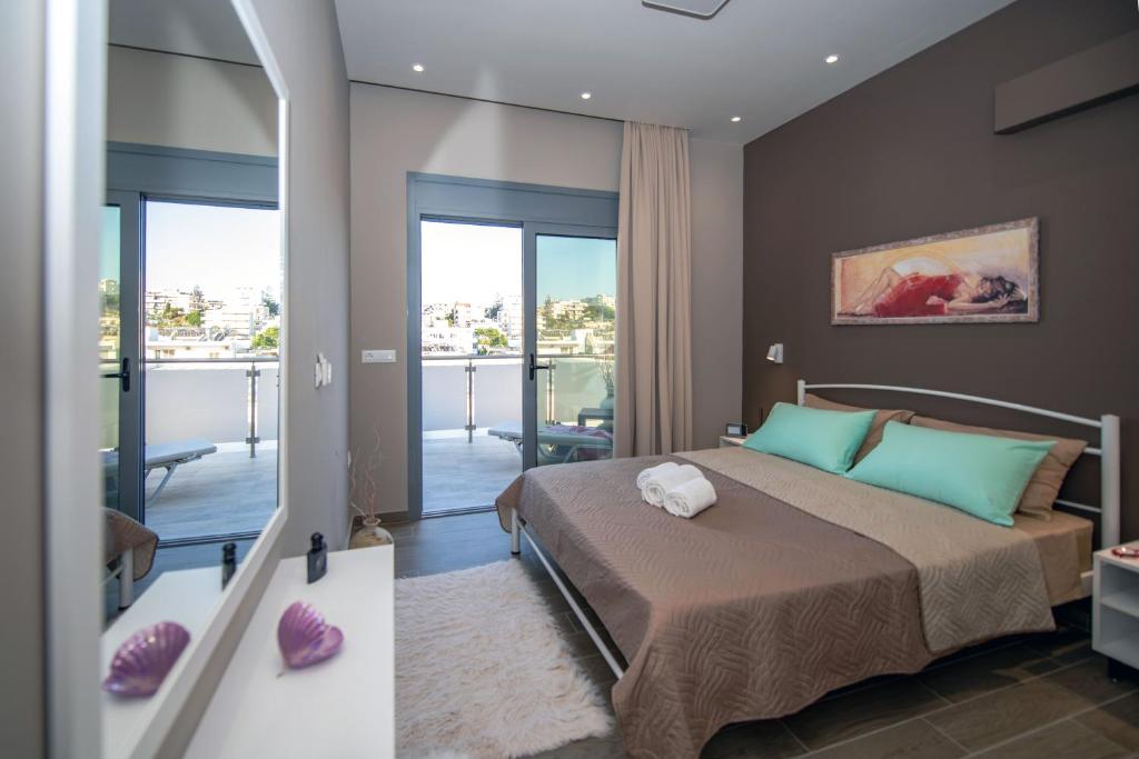 A bed or beds in a room at Calma Apartment