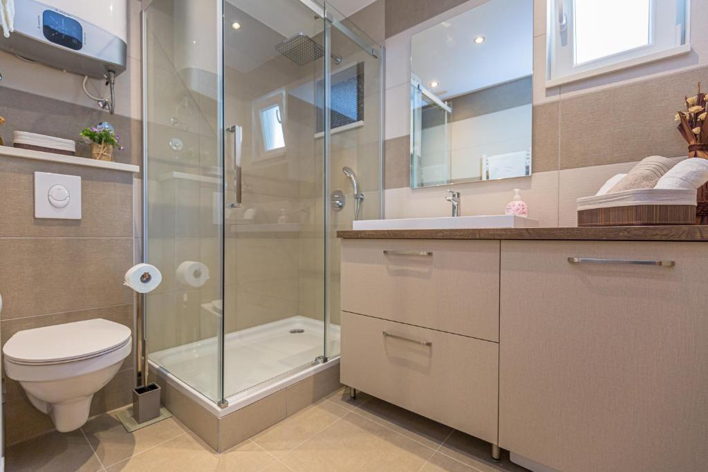 Koupelna v ubytování Apartmani Lovrenco