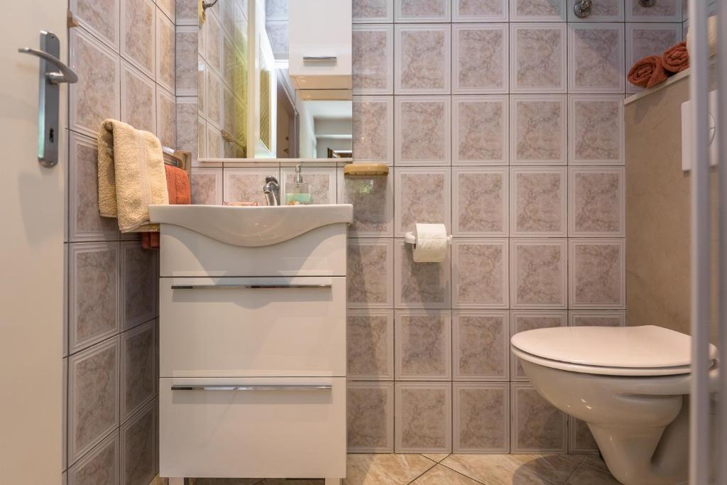 Koupelna v ubytování Apartmani Lovrenco