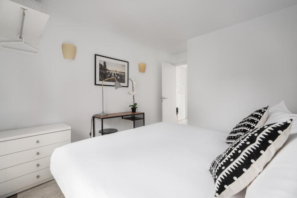 Postel nebo postele na pokoji v ubytování Apartamentos Suite The Way