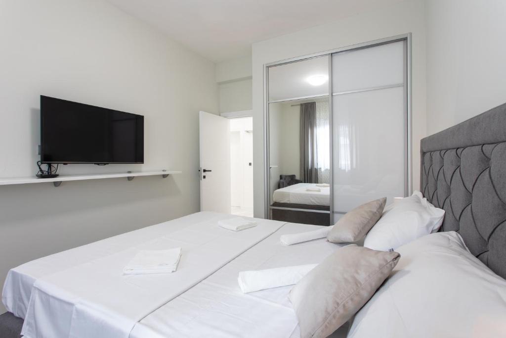 Posteľ alebo postele v izbe v ubytovaní Holiday apartment Capeta