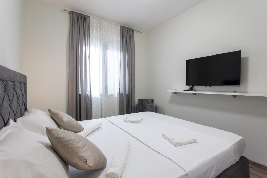 Posteľ alebo postele v izbe v ubytovaní Holiday apartment Capeta