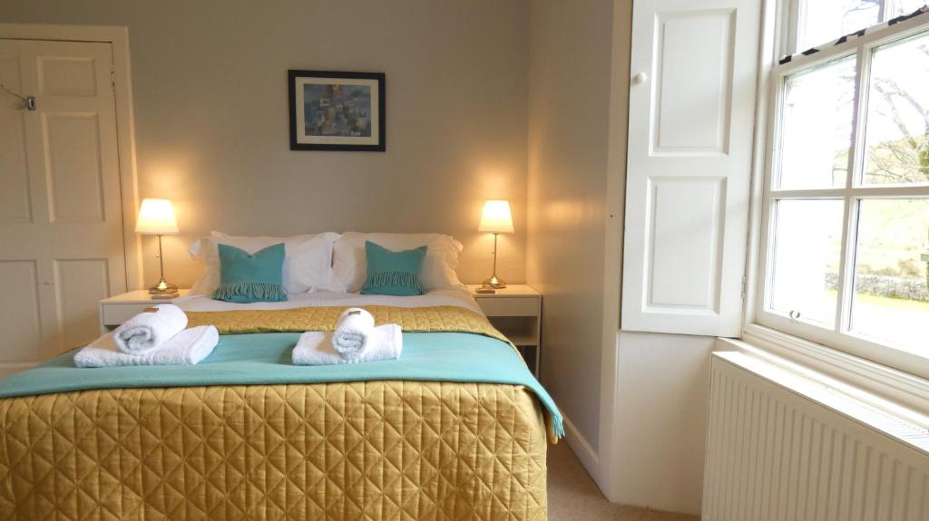 Postel nebo postele na pokoji v ubytování Kirkland House B&B