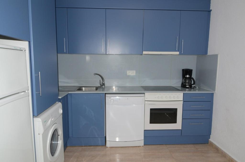 Kuchyň nebo kuchyňský kout v ubytování BONSOL 13 - apartamento duplex