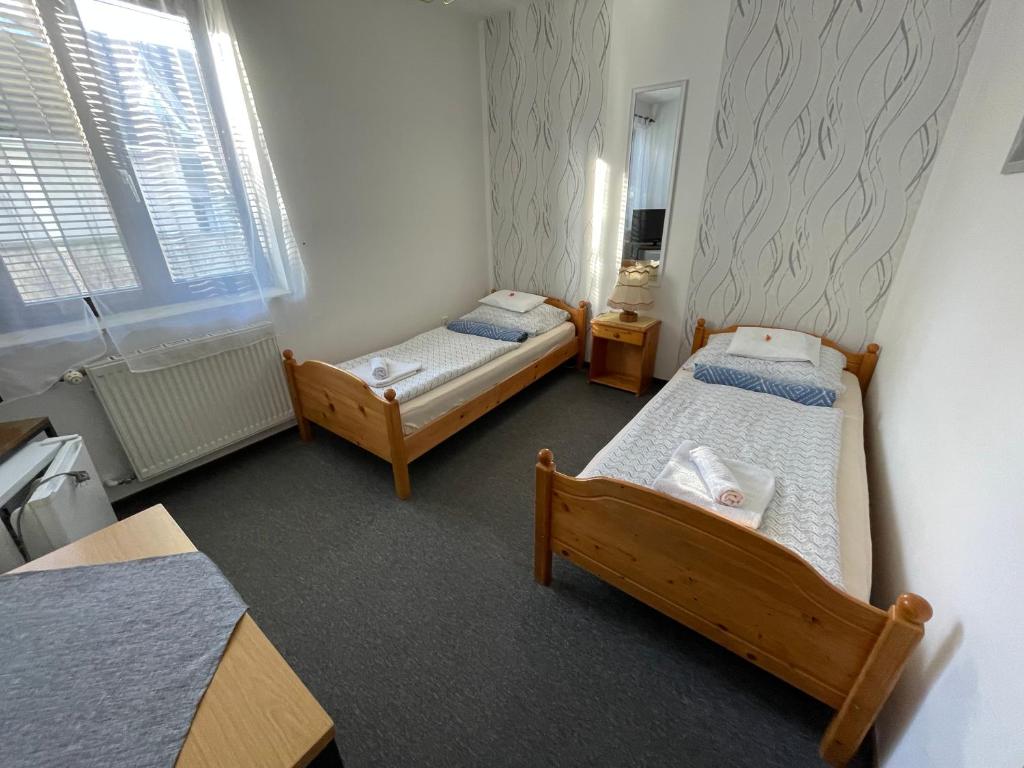 Postel nebo postele na pokoji v ubytování Hot-l Mini