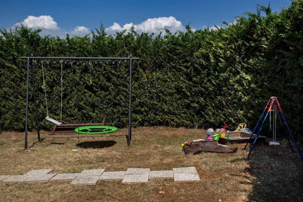 Vonkajšia záhrada v ubytovaní Apartments Villa Leylandia