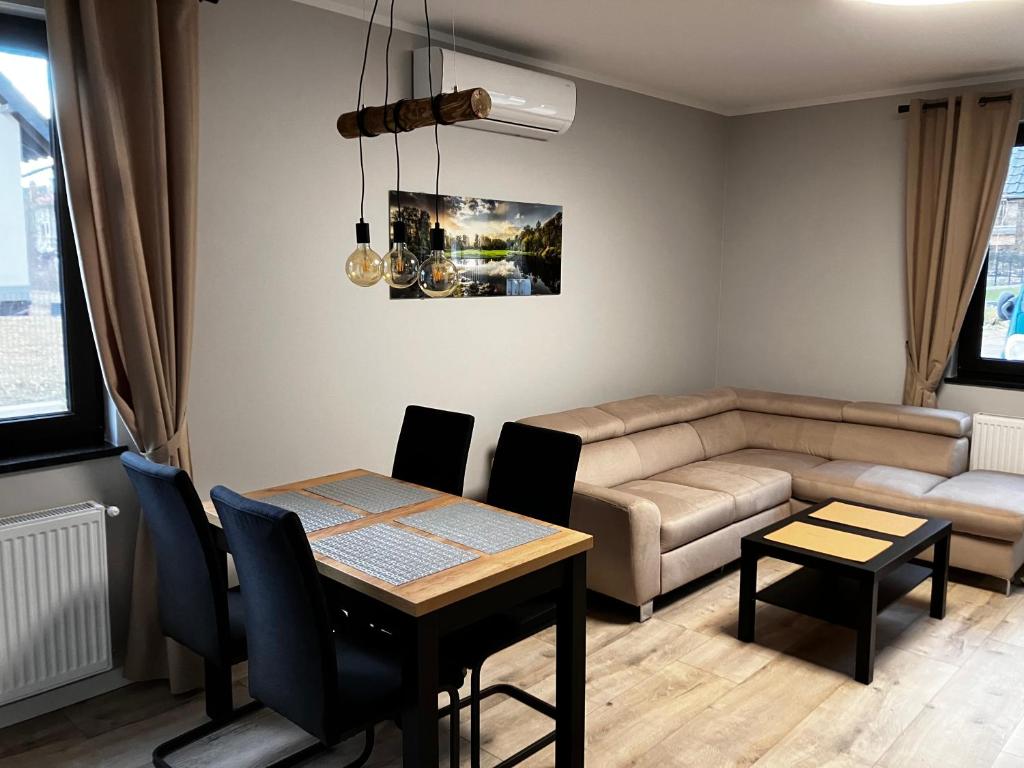 Posedenie v ubytovaní Apartamenty Czarna Perła