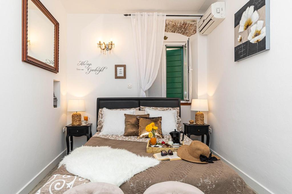 Postel nebo postele na pokoji v ubytování Rooms Tomic