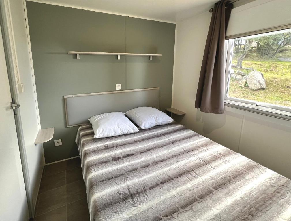 Postel nebo postele na pokoji v ubytování Chez Mina
