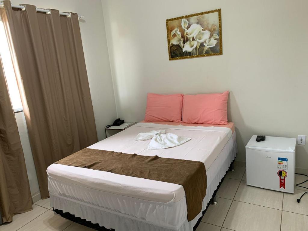 Postel nebo postele na pokoji v ubytování Hotel Alelos - Ituaçu Bahia