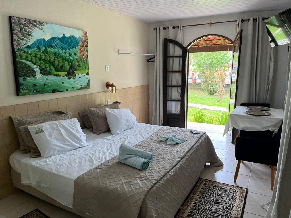 Postel nebo postele na pokoji v ubytování Pousada Chez Nous