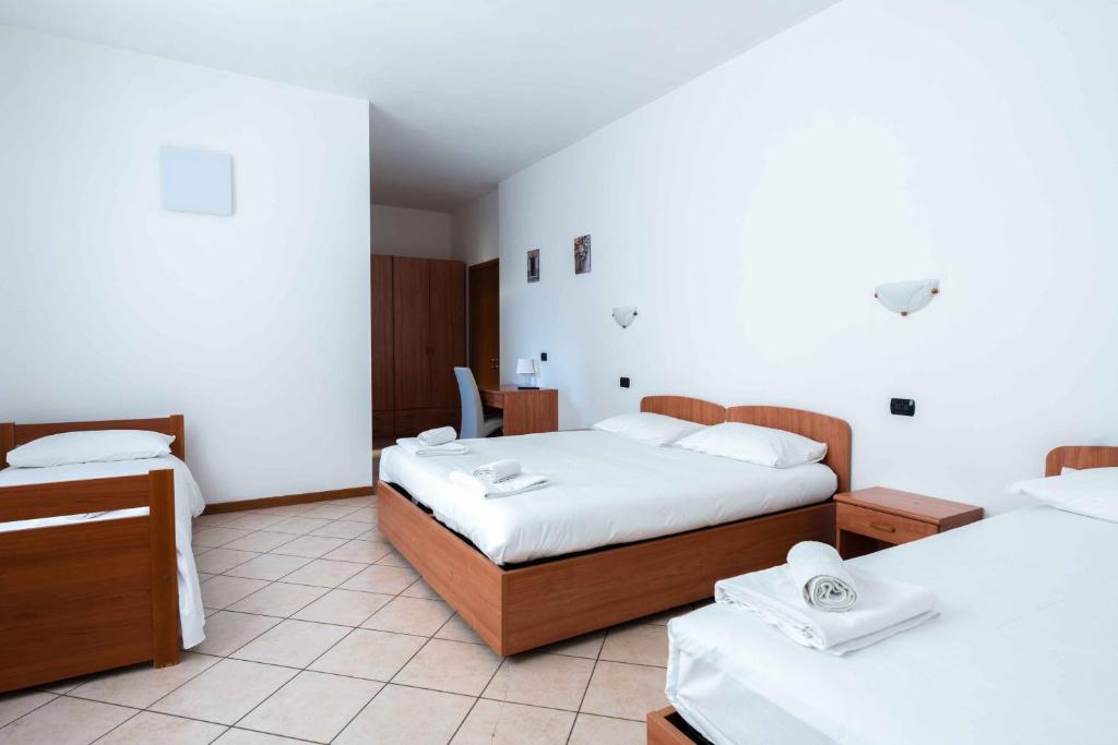 Postel nebo postele na pokoji v ubytování Wayco Rooms