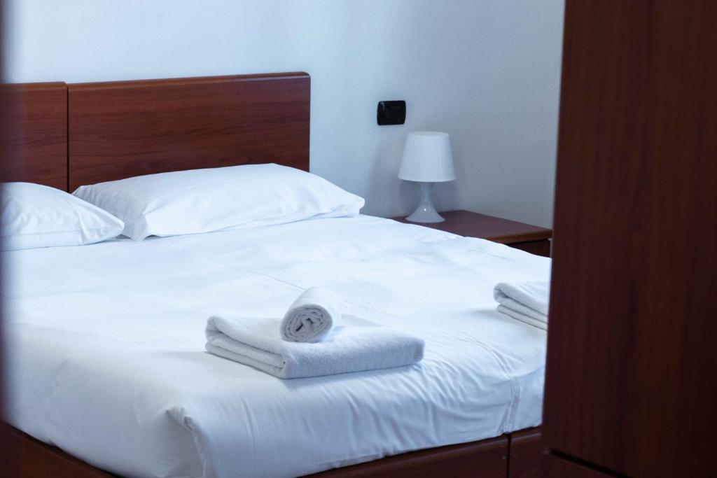 Postel nebo postele na pokoji v ubytování Wayco Rooms